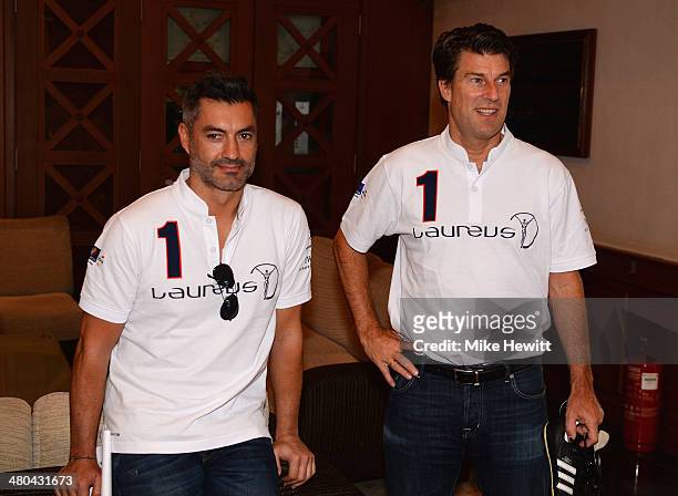 Vitor Baia and Michael Laudrup look on during the Laureus All Stars Unity Cup ahead of the 2014 Laureus World Sports Awards at Royal Selangor Club on...