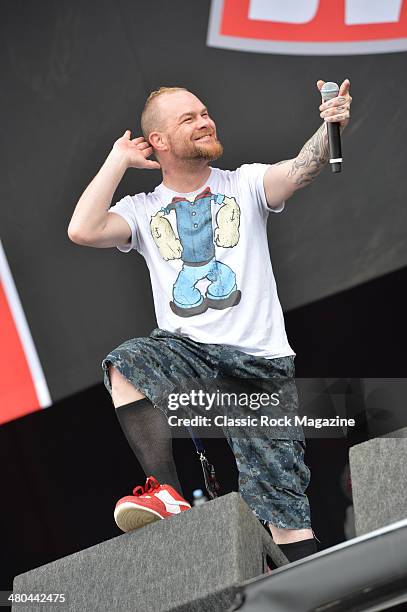 Vocalist Ivan Moody of American heavy metal group Five Finger Death Punch performing live on the Main Stage at Download Festival on June 16, 2013.