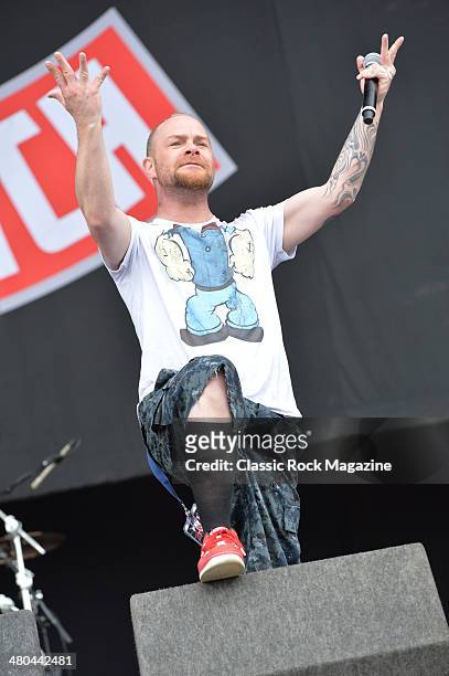 Vocalist Ivan Moody of American heavy metal group Five Finger Death Punch performing live on the Main Stage at Download Festival on June 16, 2013.