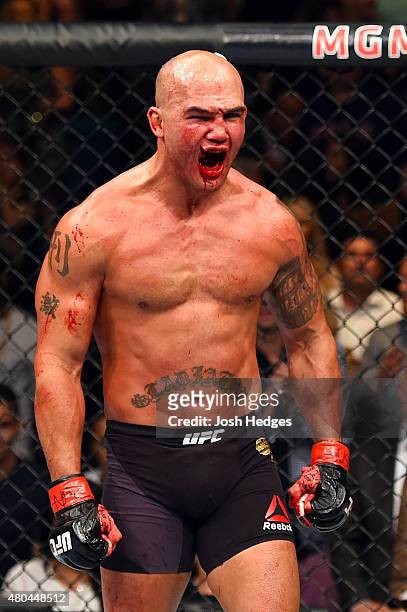 Robbie Lawler reacts to his victory over Rory MacDonald in their UFC welterweight title fight during the UFC 189 event inside MGM Grand Garden Arena...