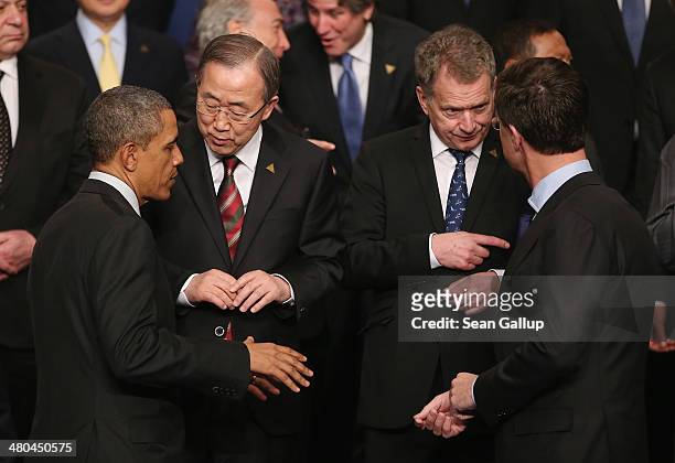 President Barack Obama chats with U.N. Secretary General Ban Ki-moon as Dutch Prime Minister Mark Rutte chats with Finnish President Sauli Niinisto...