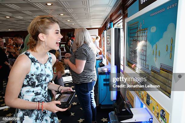 Actress Gatlin Green attends The Nintendo Lounge on the TV Guide Magazine yacht during Comic-Con International 2015 on July 11, 2015 in San Diego,...