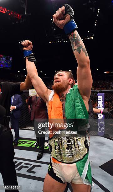 Chad Mendes reacts to his victory over Chad Mendes in their UFC interim featherweight title fight during the UFC 189 event inside MGM Grand Garden...