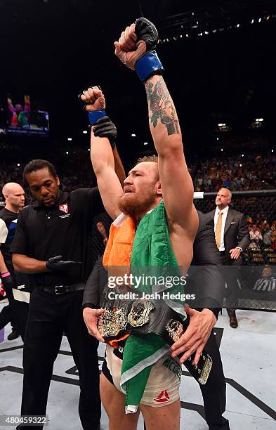 Chad Mendes reacts to his victory over Chad Mendes in their UFC interim featherweight title fight during the UFC 189 event inside MGM Grand Garden...