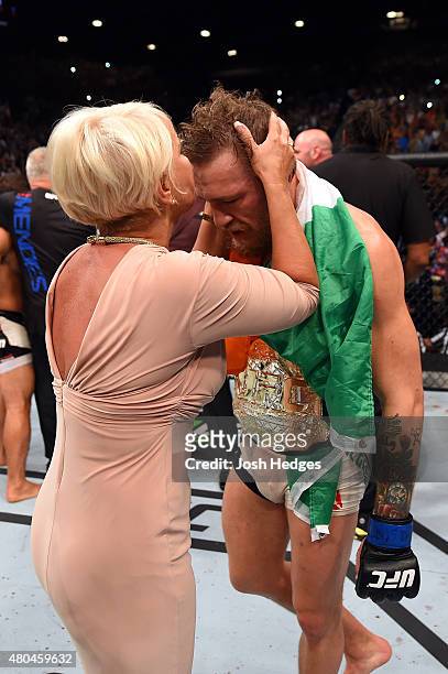 Conor McGregor and a family member after his UFC interim featherweight title fight during the UFC 189 event inside MGM Grand Garden Arena on July 11,...