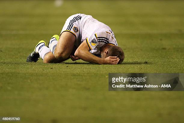 Steven Gerrard of LA Galaxy suffers an injury on his debut during the International Champions Cup match between Club America and LA Galaxy at StubHub...