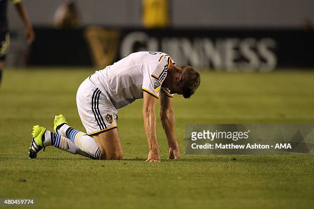 Steven Gerrard of LA Galaxy suffers an injury on his debut during the International Champions Cup match between Club America and LA Galaxy at StubHub...
