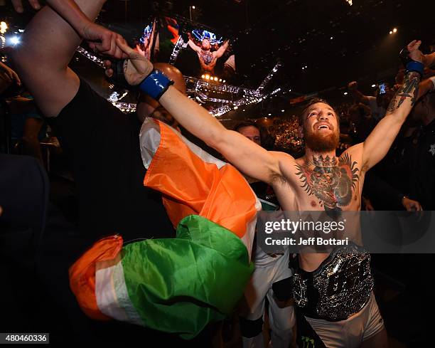 Conor McGregor celebrates with fans during the UFC 189 event inside MGM Grand Garden Arena on July 11, 2015 in Las Vegas, Nevada.