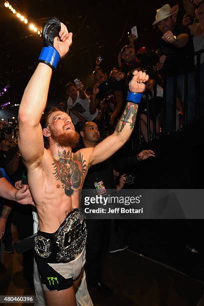 Conor McGregor celebrates with fans during the UFC 189 event inside MGM Grand Garden Arena on July 11, 2015 in Las Vegas, Nevada.