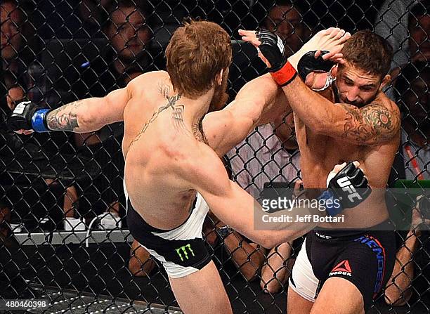 Conor McGregor kicks Chad Mendes during the UFC 189 event inside MGM Grand Garden Arena on July 11, 2015 in Las Vegas, Nevada.