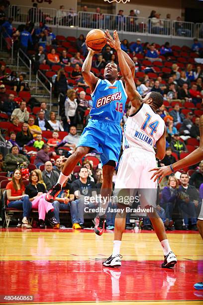 Othyus Jeffers of the Iowa Energy takes a shot in the paint against Reggie Williams of the Tulsa 66ers in an NBA D-League game on March 22, 2014 at...