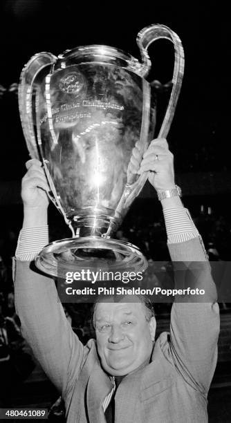 Liverpool Manager Bob Paisley lifts the trophy after their 1-0 victory over Real Madrid in the European Cup Final at the Parc des Princes in Paris,...
