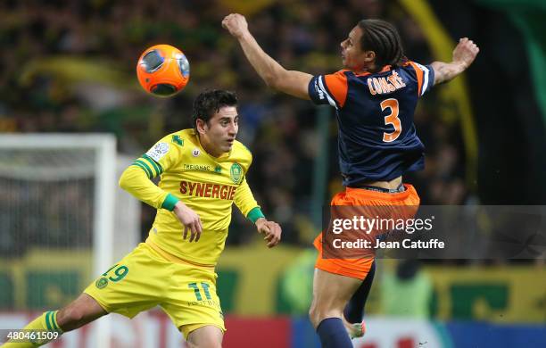 Alejandro Bedoya of Nantes and Daniel Congre of Montpellier in action during the french Ligue 1 match between FC Nantes and Montpellier Herault SC at...