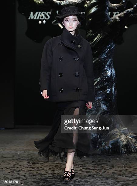 Model showcases designs on the runway during the Miss Gee Collection show as part of Seoul Fashion Week F/W 2014 on March 25 in Seoul, South Korea.