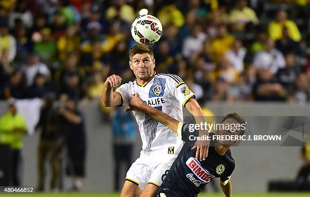 Steven Gerrard of the LA Galaxy vies for the header with Jose Daniel Guerrero of Club America in the ex-Liverpool and England international's debut...