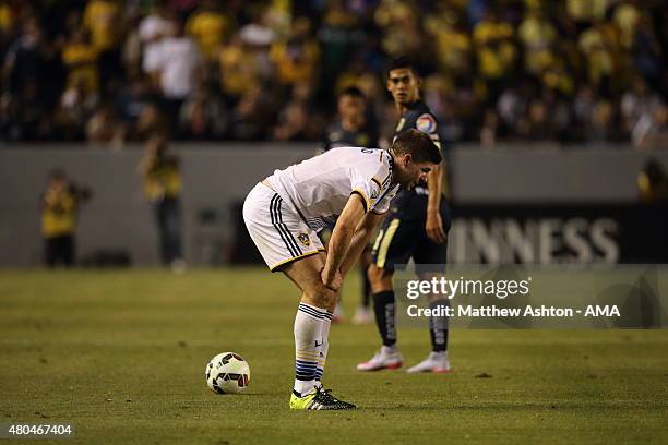 Steven Gerrard of LA Galaxy suffers an injury on his debut during the International Champions Cup match between Club America and LA Galaxy at StubHub...