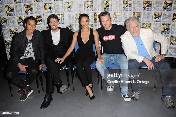 Actors Daniel Wu, Toby Kebbell, Paula Patton, Rob Kazinsky, and Clancy Brown pose at the Legendary Pictures panel during Comic-Con International 2015...