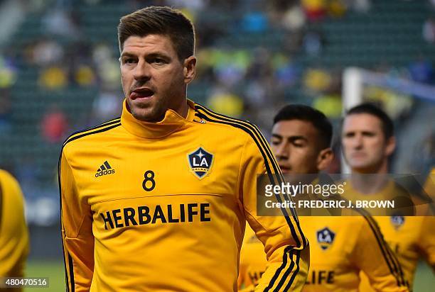 Steven Gerrard of the LA Galaxy warms up with teammates before making his debut for the MLS side against Club America on July 11, 2015 in their 2015...