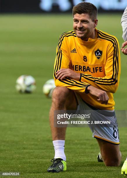 Steven Gerrard of the LA Galaxy warms up with teammates before making his debut for the MLS side against Club America on July 11, 2015 in their 2015...