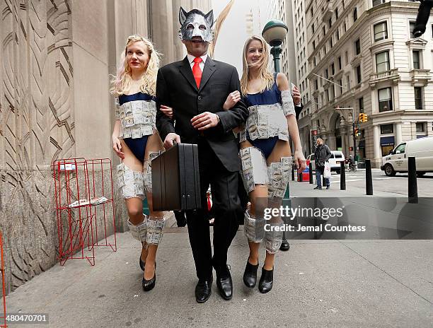 Wolf of Wall Street" arrives on Wall St. To mark the "The Wolf of Wall Street" DVD Release outside of the New York Stock Exchange on March 25, 2014...