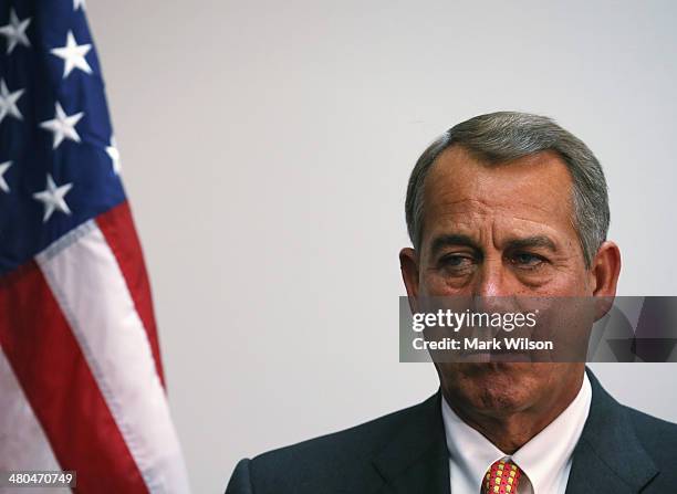 House Speaker John Boehner listens to questions from the media after attending the weekly House Republican conference at the U.S. Capitol March 25,...