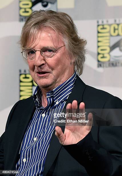 Vikings" creator/writer Michael Hirst waves as he arrives at a panel for the History series "Vikings" during Comic-Con International 2015 at the San...