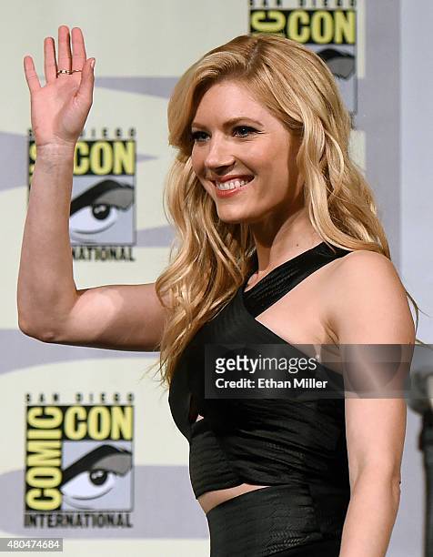 Actress Katheryn Winnick waves as she arrives at a panel for the History series "Vikings" during Comic-Con International 2015 at the San Diego...