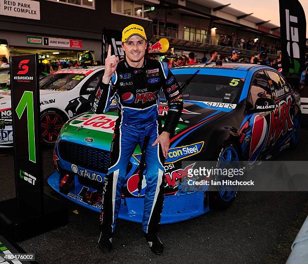 Mark Winterbottom who drives the Pepsi Max Crew Ford celebrates after winning race 17 of the Townsville 400 at Reid Park on July 12, 2015 in...