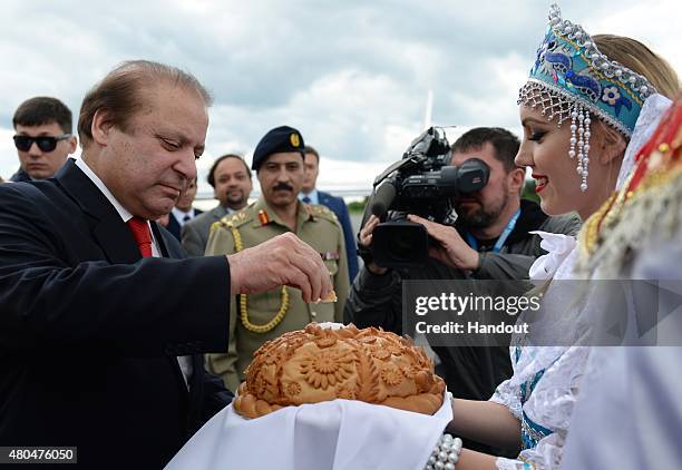In this handout image supplied by Host Photo Agency / RIA Novosti, Prime Minister of the Islamic Republic of Pakistan Muhammad Nawaz Sharif arrives...