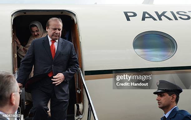 In this handout image supplied by Host Photo Agency / RIA Novosti, Prime Minister of the Islamic Republic of Pakistan Muhammad Nawaz Sharif arrives...