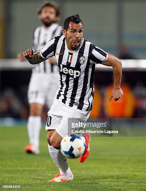 Carlos Tevez of Juventus during the Serie A match between Calcio Catania and Juventus at Stadio Angelo Massimino on March 23, 2014 in Catania, Italy.