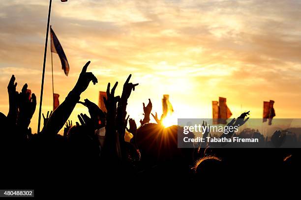 The sun sets on the festival crowd on Day 1 of the Glastonbury Festival at Worthy Farm, Pilton on June 26, 2015 in Glastonbury, England.