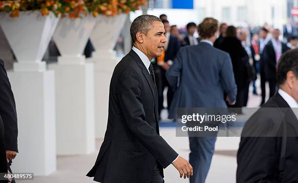 President Barack Obama leave the 2014 Nuclear Security Summit March 25, 2014 in The Hague, the Netherlands. Leaders from around the world have come...