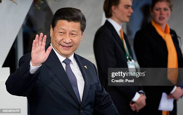 Xi Jinping, president of China departs at the conclusion of the 2014 Nuclear Security Summit on March 25, 2014 in The Hague, Netherlands. Leaders...