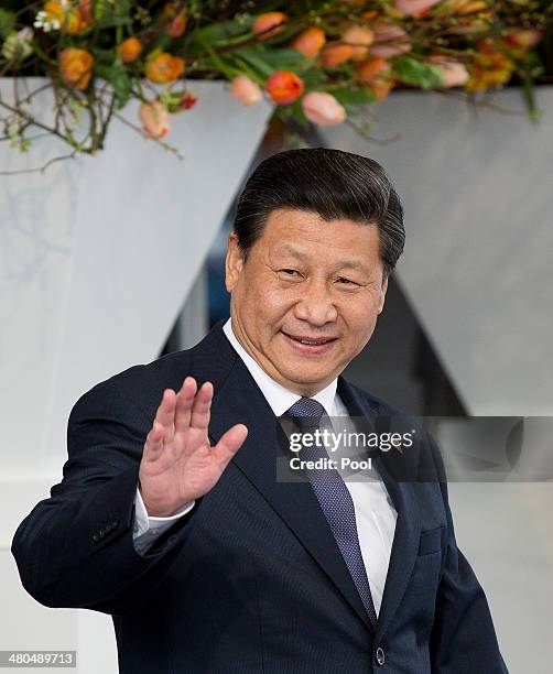 Xi Jinping, president of China departs at the conclusion of the 2014 Nuclear Security Summit on March 25, 2014 in The Hague, Netherlands. Leaders...