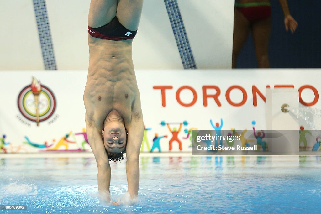 TORONTO, ON- JULY 11 - Canadian Philippe Gagne enters the water on ...