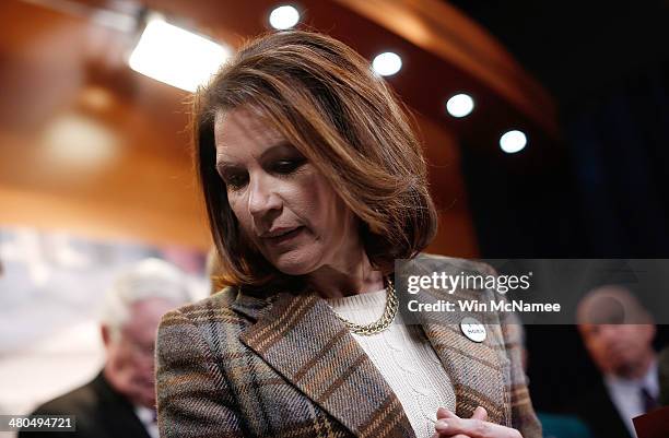 Rep. Michele Bachmann finishes speaking during a news conference at the U.S. Capitol following oral arguments at the Supreme Court on issues...
