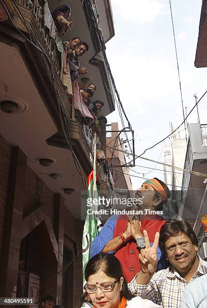 Candidate from North-east Delhi Lok Sabha constituency Manoj Tiwari during an election campaign at Rohtas Nagar Shahdra on March 25, 2014 in New...