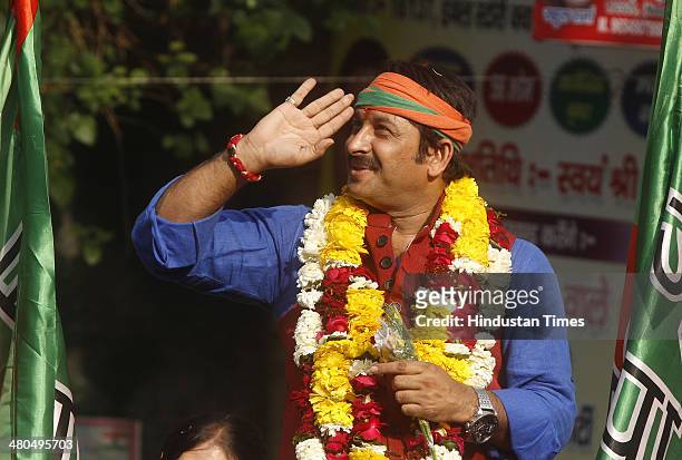 Candidate from North-east Delhi Lok Sabha constituency Manoj Tiwari during an election campaign at Rohtas Nagar Shahdra on March 25, 2014 in New...