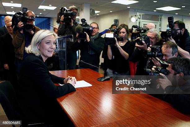 Marine Le Pen , President French far-right party National Front delivers a speech during a press conference following the first round of the mayoral...