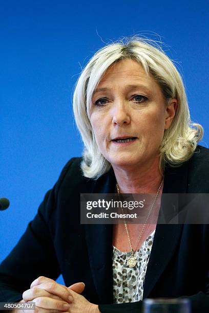 Marine Le Pen , President French far-right party National Front delivers a speech during a press conference following the first round of the mayoral...