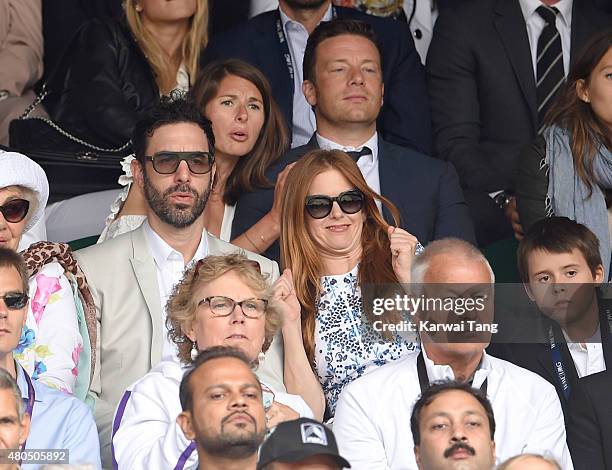 Sacha Baron Cohen, Jools Oliver, Jamie Oliver and Isla Fisher attend day 13 of the Wimbledon Tennis Championships at Wimbledon on July 12, 2015 in...