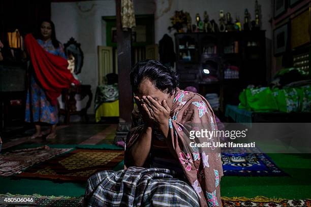 Inez, a member of a Pesantren boarding school, Al-Fatah, for transgender people known as 'waria' pray during Ramadan on July 12, 2015 in Yogyakarta,...
