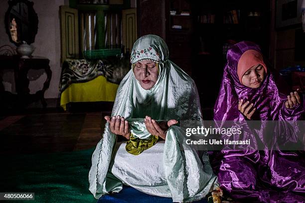 Shinta Ratri, a leader of a Pesantren boarding school, Al-Fatah, for transgender people known as 'waria' prays during Ramadan on July 08, 2015 in...