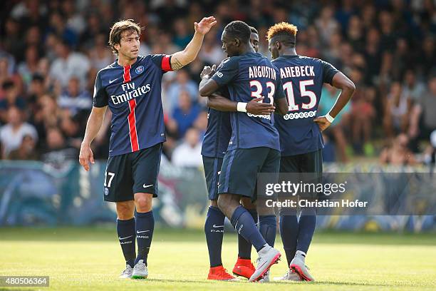 Maxwell Scherrer Cabelino Andrade, Jean-Kevin Augustin and Jean-Christophe Bahebeck of Paris Saint-Germain celebrate after scoring during the...