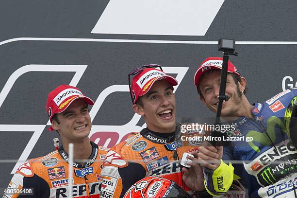 Dani Pedrosa of Spain and Repsol Honda Team, Marc Marquez of Spain and Repsol Honda Team and Valentino Rossi of Italy and Movistar Yamaha MotoGP...