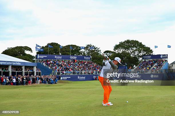 Rickie Fowler of the United States hits an approach shot on the 18th hole during the final round of the Aberdeen Asset Management Scottish Open at...