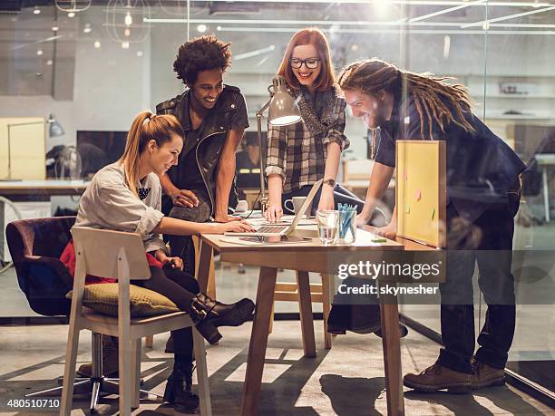 happy start-up team using computer on meeting in office. - hipster office stock pictures, royalty-free photos & images