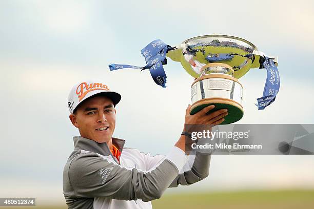 Rickie Fowler of the United States celebrates with the trophy during the trophy presentation after winning the Aberdeen Asset Management Scottish...