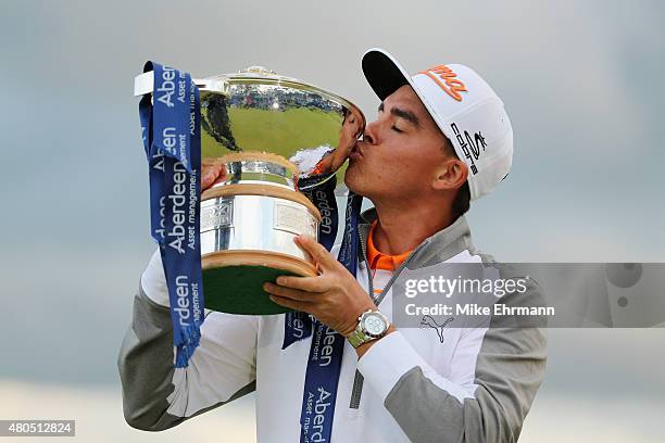 Rickie Fowler of the United States celebrates with the trophy during the trophy presentation after winning the Aberdeen Asset Management Scottish...